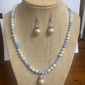 Pair of necklace and earrings.